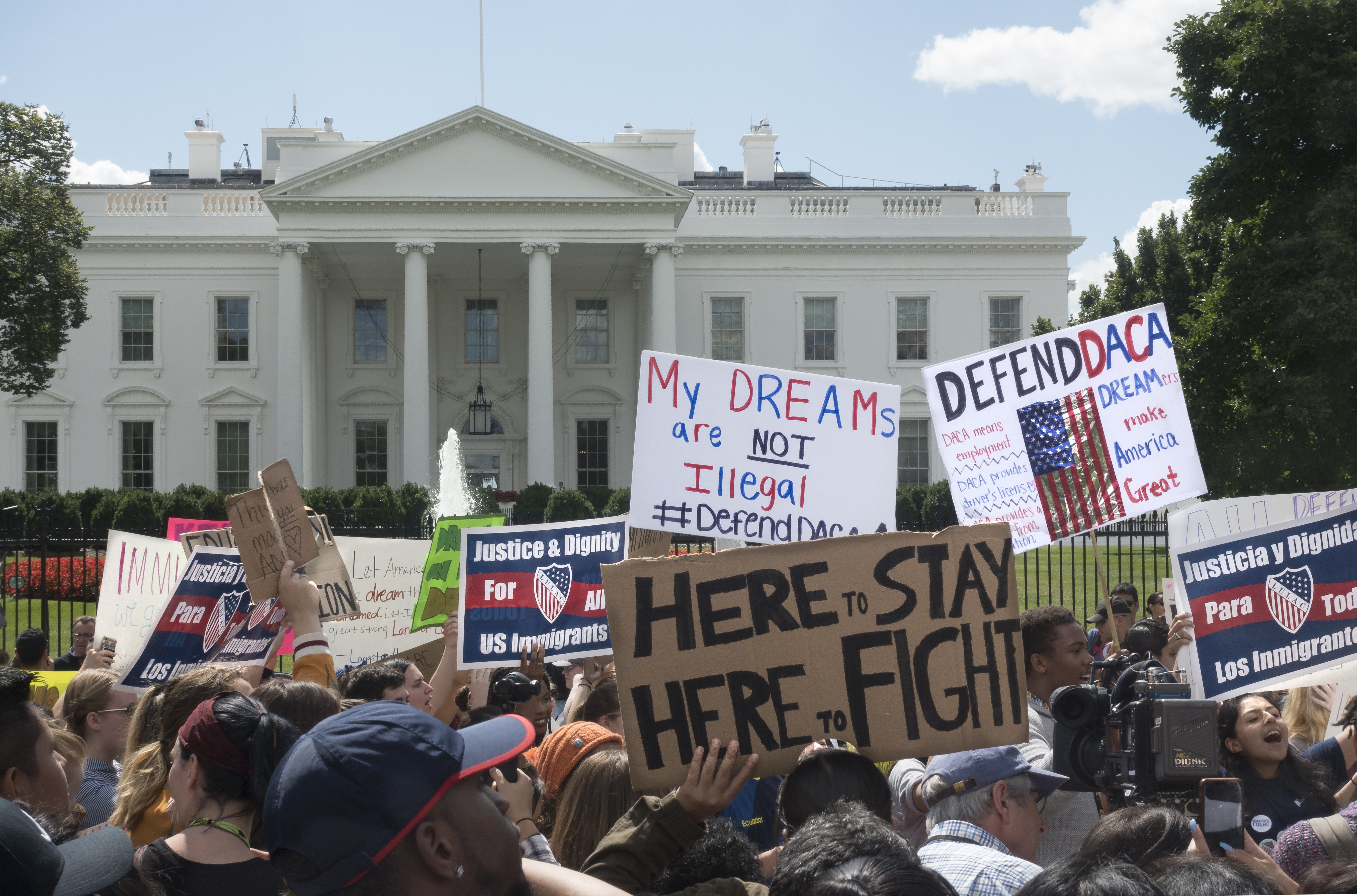 Demonstrators at the White House protest President Trump's decision to end the Deferred Action for Childhood Arrivals (DACA) program in September 2017.