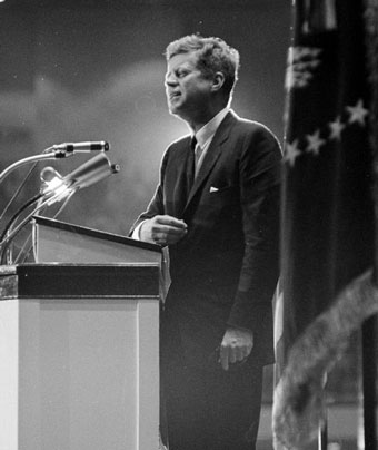 John f kennedy at lecturn