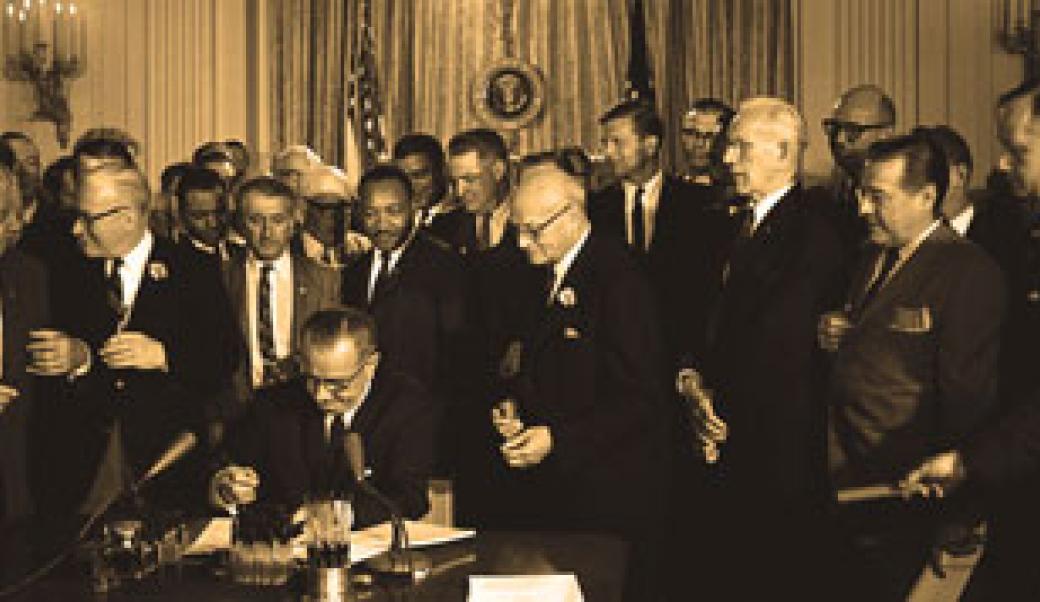 President Johnson signing