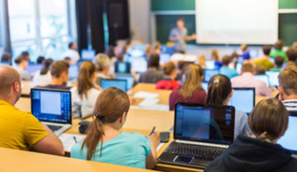 Teacher standing in front of a classroom