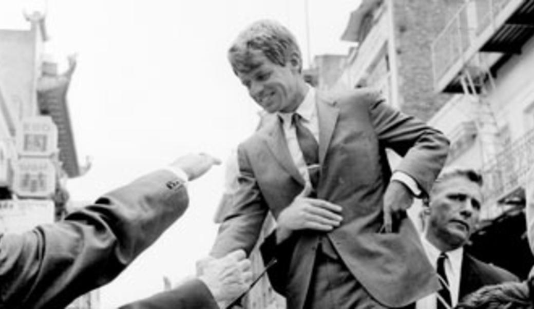 RFK shaking hands with the public
