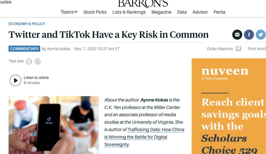 screenshot of article headline and photograph of hand holding phone showing TikTok logo