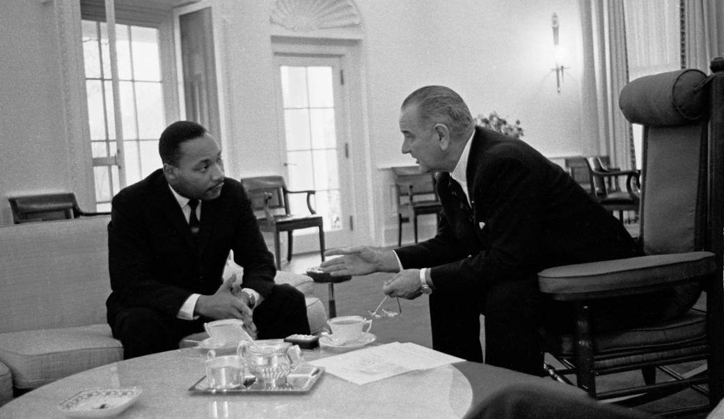 President Lyndon B. Johnson speaks with Martin Luther King Jr.