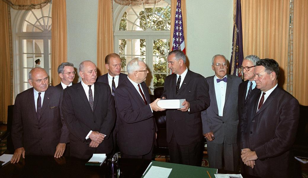 Warren commission presenting report on assassination of JFK to President Johnson 