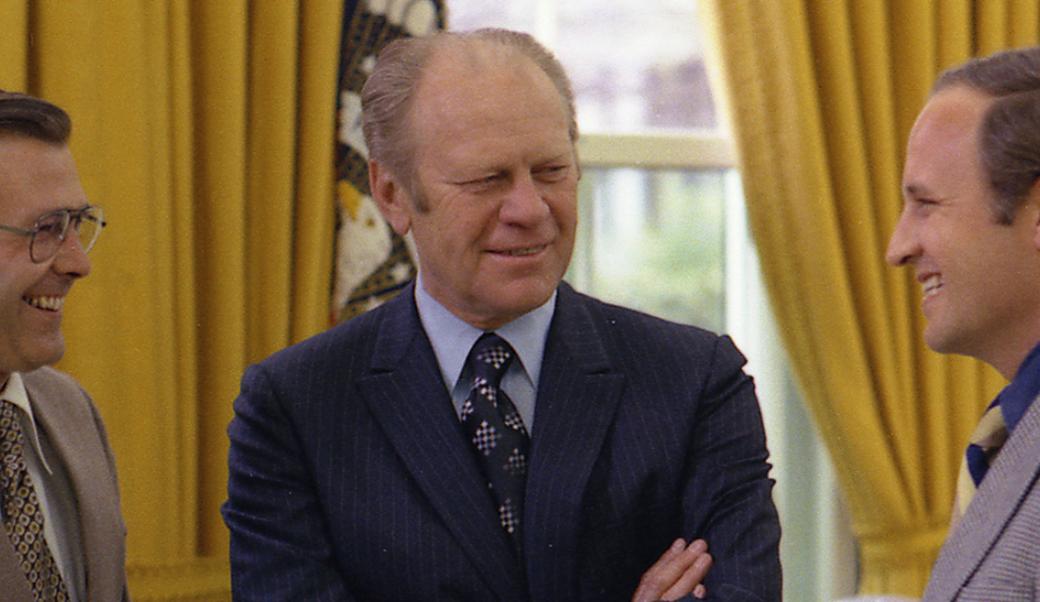 Donald Rumsfeld, President Gerald Ford, and Dick Cheney talk in Oval Office