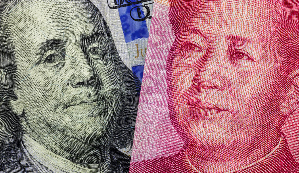 American dollar and Chinese yuan next to each other